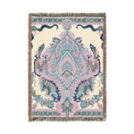 Intricate Floral and Serpentine Woven Blanket full view, cream ground with blush and teal central medallion, serpentine navy border fringe