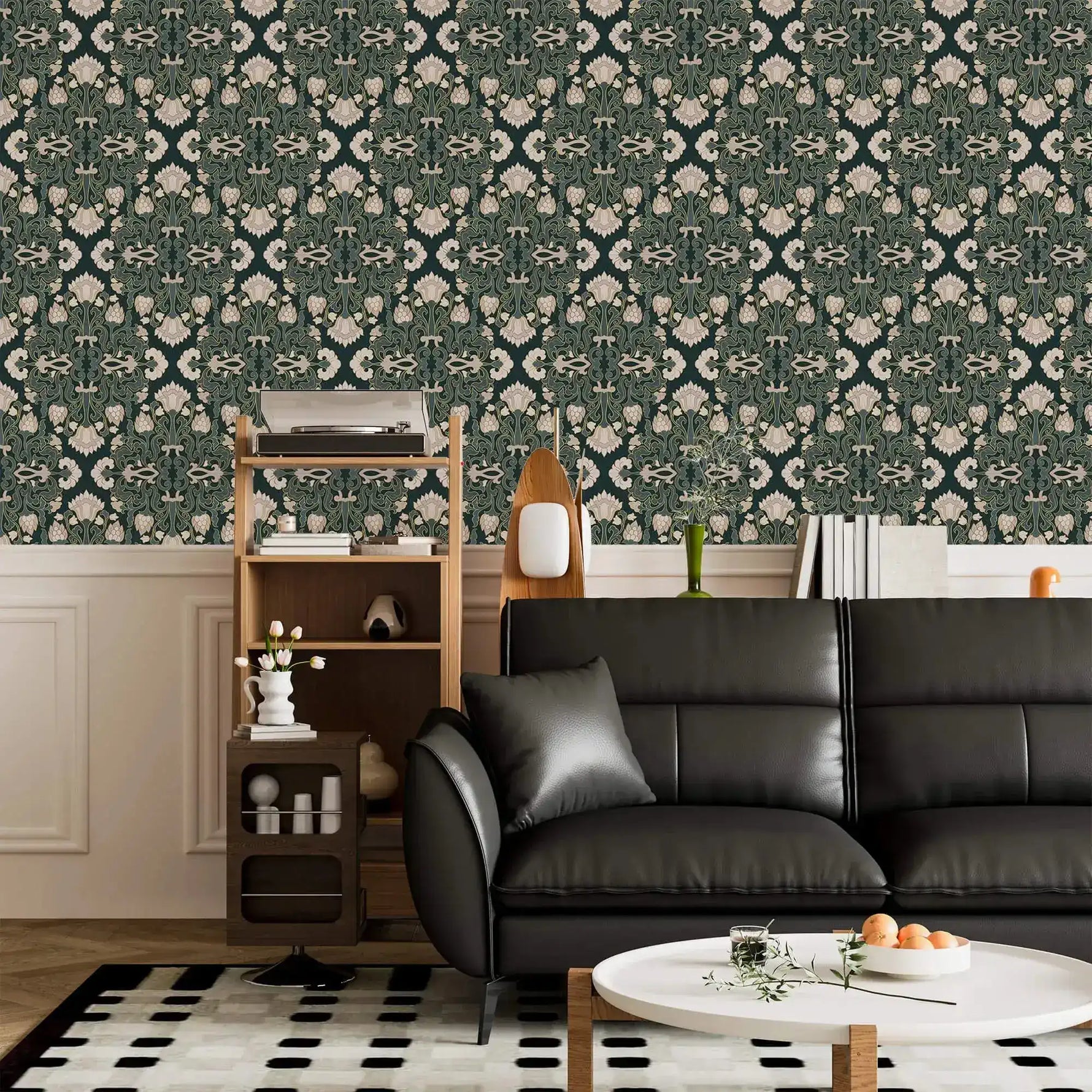 Intricate floral block print wallpaper, cream damask blooms on deep teal above a black leather sofa