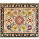 Intricate hand-tufted area rug featuring a vibrant floral design with a vintage touch, perfect for enhancing the elegance of living room spaces. This wool rug showcases a colorful array of flowers, making it an ideal choice for those seeking stylish living room area rugs.