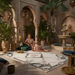 Woman in a luxurious interior setting with arches, plants, and a fountain.