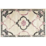 Ivory Bloom Border Hand Tufted Rug, a luxurious wool area rug perfect for a large living room. This vintage rug features an intricate floral design in soft pink and black tones, adding a touch of elegance to any space. Ideal for those seeking large area rugs to complement their living room decor.