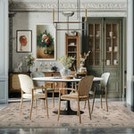 Elegant living room featuring an Ivory Whispers Hand Tufted Area Rug in an 8x10 size. This vintage wool rug adds a touch of sophistication to the space, complementing the classic decor and furniture. The large living room rug is beautifully designed with intricate floral patterns, perfectly suited for enhancing the charm of any stylish home.