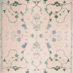 Ivory Whispers Hand Tufted Rug featuring a delicate floral pattern, perfect as a wool area rug for living rooms. This large 8x10 vintage rug adds elegance and warmth to any space.