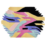 Top view of the Jagged Rhythm Dream Hand Tufted Area Rug, a contemporary wool rug featuring an abstract design with vibrant colors like pink, blue, yellow, and black. Ideal for large living rooms, this area rug adds a bold and artistic touch to any space.