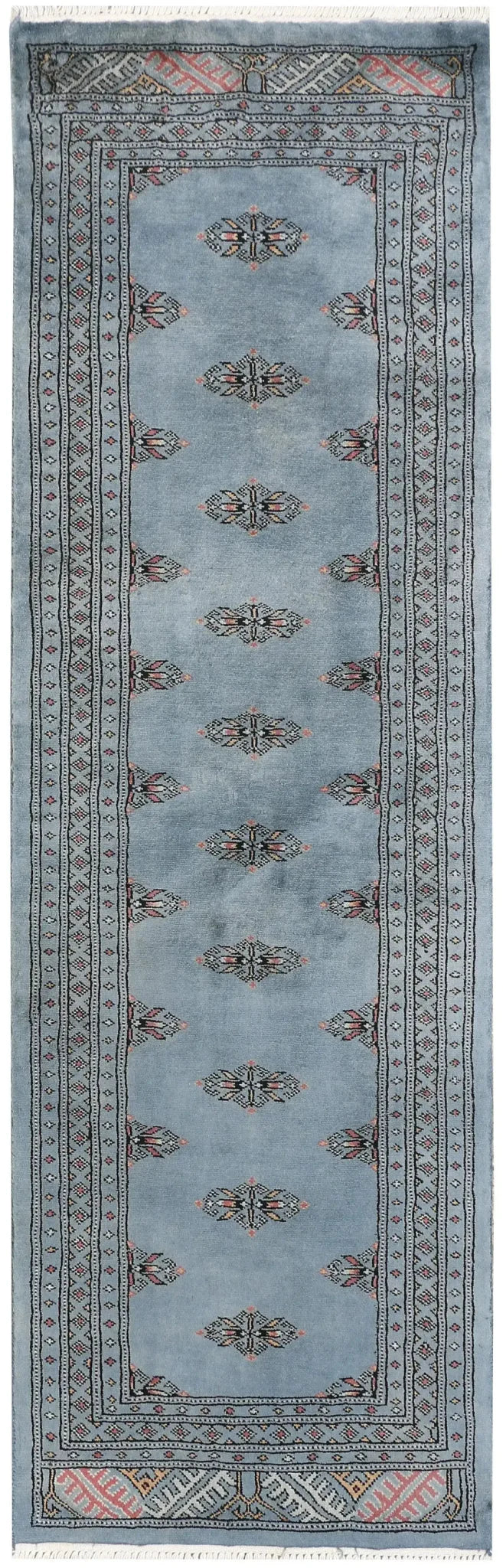 The Javarak Blue Hand Knotted Area Rug features an intricate design with a soft blue background and detailed geometric patterns. Ideal for large living rooms, this area rug combines elegance with durability, making it a perfect choice for those seeking stylish area rugs for living room spaces.