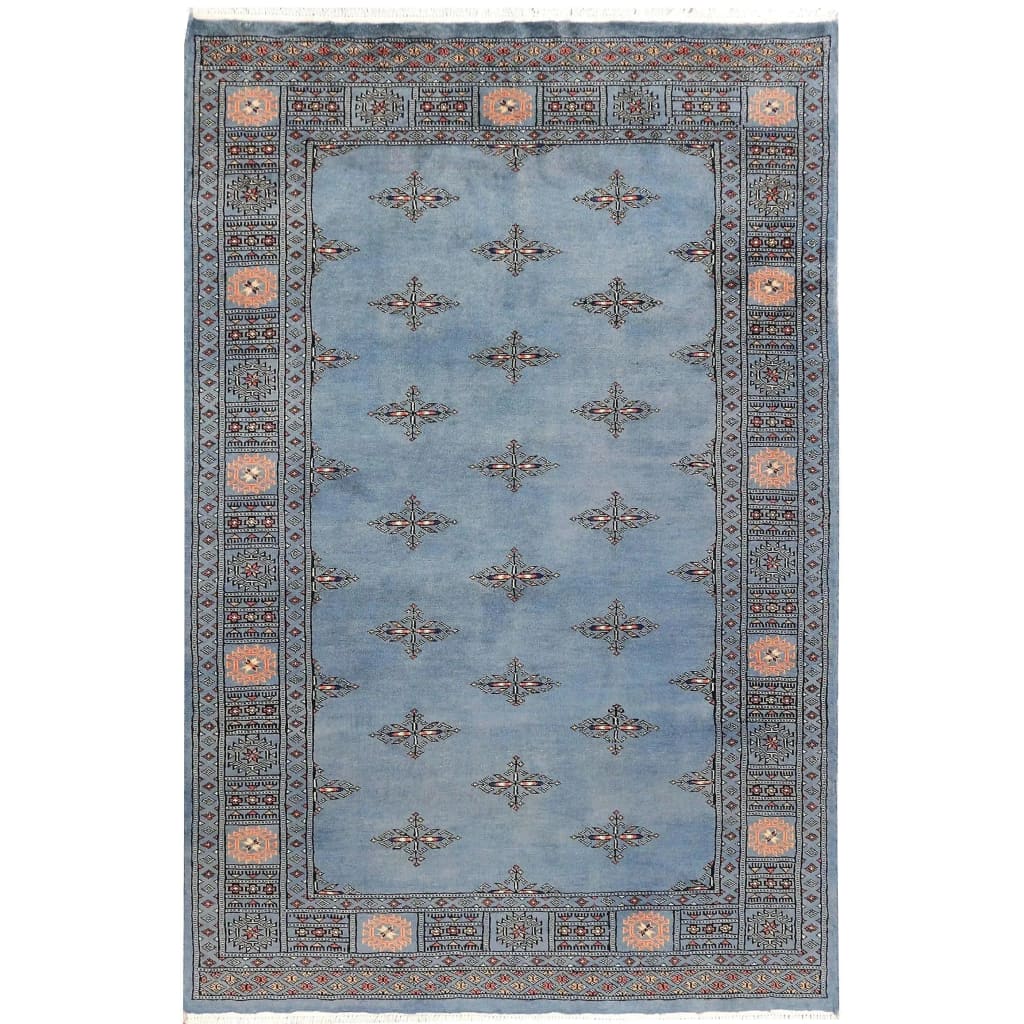 Elegant Javarak Blue Hand Knotted Area Rug featuring an intricate pattern with a serene blue background and detailed border design. Perfect for enhancing the ambiance of large living rooms, this area rug offers both style and comfort.