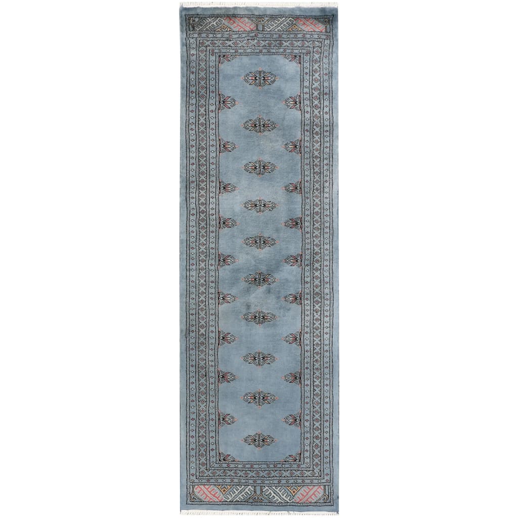 The Javarak Blue Hand Knotted Area Rug features a stunning traditional design with intricate patterns and a soft blue hue, perfect for adding elegance to large living room spaces. This exquisite area rug is ideal for those seeking high-quality area rugs for living room decor.