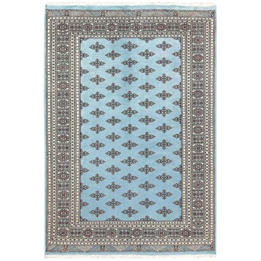 The Javarak Blue Hand Knotted Area Rug showcases an intricate design with a soft blue background and elegant geometric patterns, perfect for elevating your living space. This exquisite area rug is ideal for those seeking large living room rugs that combine style and comfort.