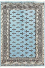 The Javarak Blue Hand Knotted Area Rug showcases an intricate design with a soft blue background and elegant geometric patterns, perfect for elevating your living space. This exquisite area rug is ideal for those seeking large living room rugs that combine style and comfort.