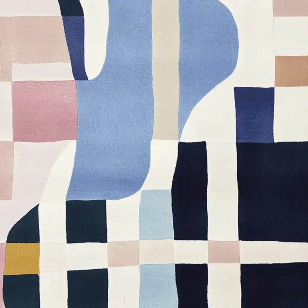 Top view of the Jenga Jazz Hand Tufted Area Rug featuring an abstract geometric design with vibrant colors including blue, pink, and beige. This contemporary wool rug is perfect as a large living room rug, with dimensions of 8x10, offering a bold and artistic flair to any space.