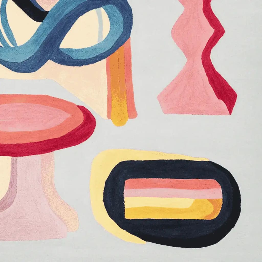 Close-up of the Joy Shape Parade Hand Tufted Area Rug showcasing its vibrant abstract design. This contemporary wool rug features bold colors and geometric shapes, perfect for adding a modern touch to living room area rugs.
