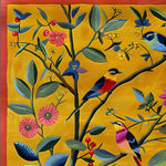 Vibrant floral area rug featuring colorful birds and lush greenery, perfect for enhancing your living room decor. This hand-tufted wool rug showcases an intricate design with bright hues on a warm background, ideal for large living room spaces.