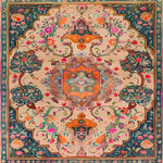 This beautiful square area rug, titled 'Joyful Orchard Hand Knotted Area Rug', showcases a vibrant floral pattern with intricate Persian designs, perfect for a formal dining room. The exquisite vintage rug features a harmonious blend of colors, including rich oranges, greens, and blues, intricately woven into a wool rug that adds elegance to any dining room setting.