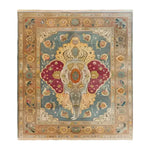 The Jumbo Jubilee Hand Knotted Area Rug features an intricate design with a central elephant motif, surrounded by a rich tapestry of floral patterns. This vintage rug, ideal for large living rooms, showcases a blend of vibrant colors, reminiscent of traditional Persian rugs, making it a perfect choice for those seeking elegant rugs for living room decor.