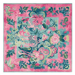 Vibrant Jungle Bloom Hand Tufted Rug showcasing an abstract floral design with lively pink, blue, and green hues. This luxurious wool rug is a perfect square area rug, ideal for adding a splash of color to large living rooms. The intricate patterns make it a standout piece among area rugs for living room spaces.