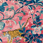 Vibrant Jungle Bloom Hand Tufted Rug featuring a tiger amidst lush floral patterns on a pink background. Perfect for adding a touch of the wild to large living rooms, this square wool rug seamlessly combines elegance with nature-inspired design.