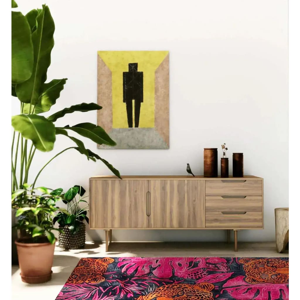 Stylish interior featuring a vibrant Jungle Chic Hand Tufted Area Rug with abstract patterns in pink and orange. The wool rug adds a pop of color to the room, making it a perfect choice for a bedroom or dining room. The setting includes a wooden sideboard, potted plants, and modern art on the wall, creating a cozy and chic atmosphere.