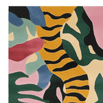 Vibrant abstract area rug featuring bold, colorful patterns inspired by jungle rhythms. This contemporary wool rug showcases a vivid mix of greens, pinks, and yellows, perfect for adding a lively touch to living room area rugs.