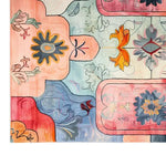 Vibrant Area Rug with an abstract floral design in a mix of pastel and bold colors, showcasing the intricate patterns of a hand tufted wool rug. Ideal for large living room spaces, this vintage rug adds a touch of elegance and style.