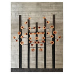 Kibushi Harmony Hand Tufted Wool Rug showcasing a contemporary design with abstract floral patterns. This area rug features a blend of warm and earthy tones, making it ideal for large living rooms. Crafted from wool, it embodies a modern aesthetic perfect for enhancing the elegance of your living space.