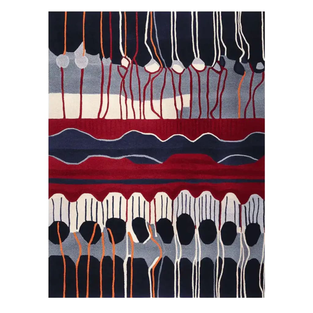 A vibrant area rug with an abstract design featuring bold red, blue, and white colors. This contemporary wool rug is perfect for adding a modern touch to large living room spaces. The hand-tufted pattern creates a dynamic visual flow, ideal for those seeking unique living room area rugs.
