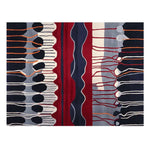 Top view of the Kinetic Vein Flow Hand Tufted Rug, a contemporary wool area rug featuring an abstract design with bold red, blue, and black patterns. Perfect for large living rooms, this rug adds a dynamic touch to any space.