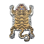 A unique King of the Cats hand-tufted wool rug in the shape of an abstract tiger, perfect for adding a bold statement to your dining room or living room. This area rug features intricate tiger patterns in warm tones, ideal for those seeking distinctive area rugs for living room and dining room spaces.