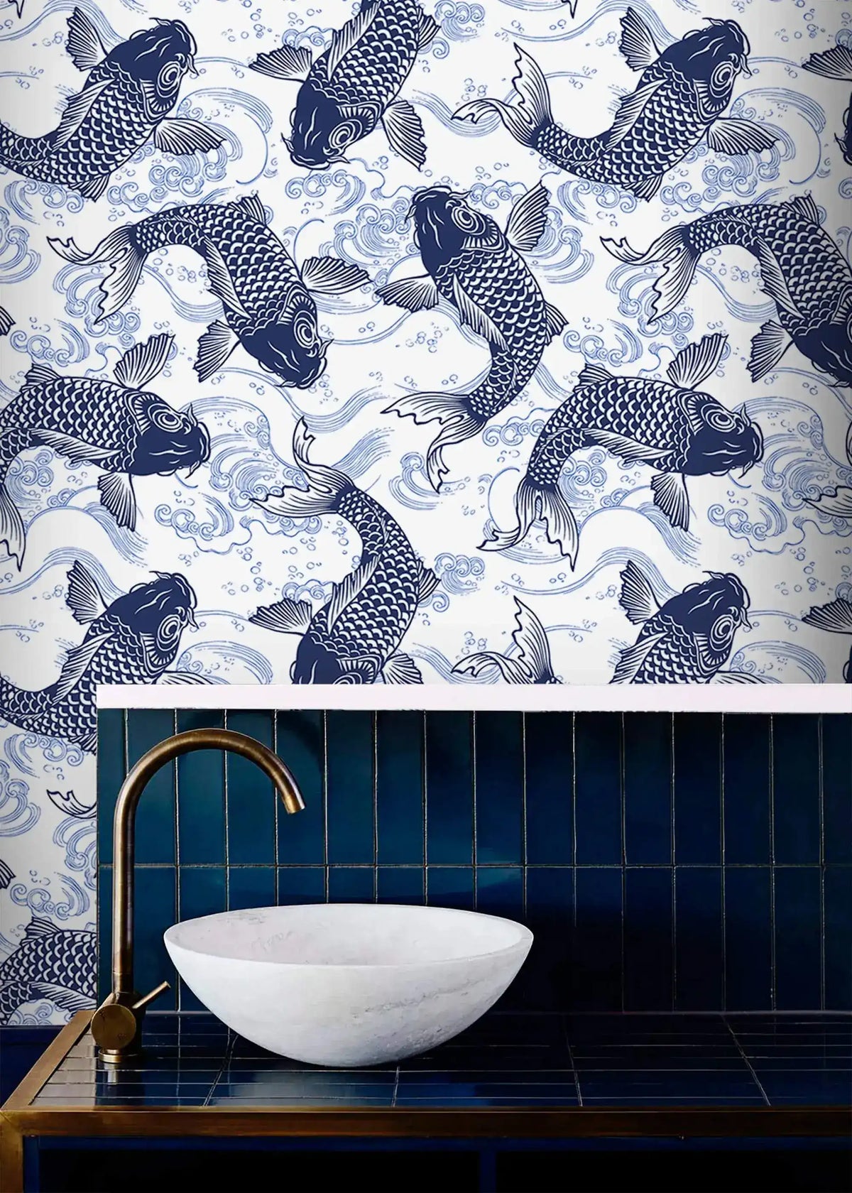 Koi Pond Serenity indigo koi wallpaper above navy tiles with a marble vessel basin and brass tap