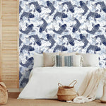 Koi Pond Serenity wallpaper of navy koi and waves behind a white bed with striped pillow and basket