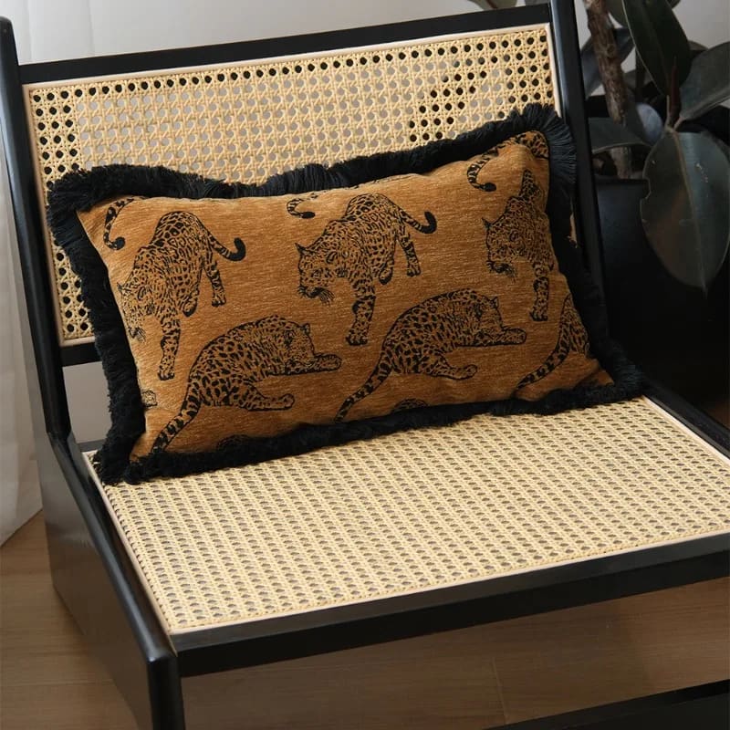 Lavish leopard lounge throw pillow cover featuring a stylish design with leopards on a warm background, perfect for home decor.