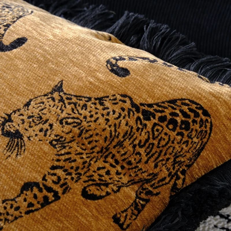 Lavish leopard lounge throw pillow cover featuring a stylish leopard print design and fringed edges, perfect for adding a bold touch to your home decor.