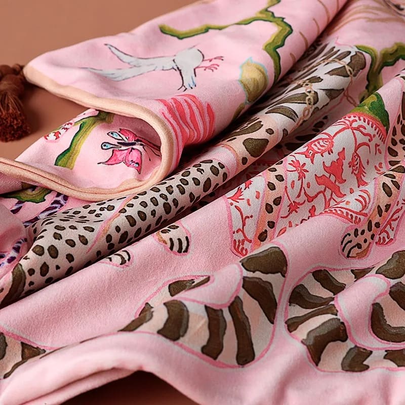 Lavish twin leopard oasis throw pillow cover featuring vibrant pink fabric adorned with playful leopard and floral patterns, perfect for adding a pop of color to your home decor.