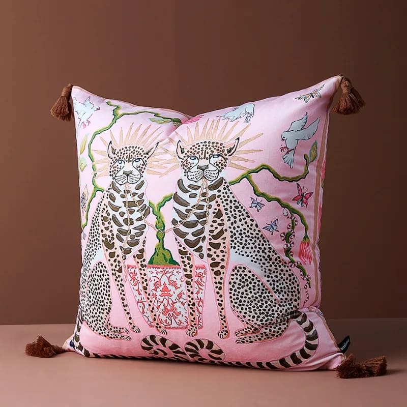 Lavish twin leopard throw pillow cover featuring intricate designs, vibrant colors, and tassel accents, perfect for adding a touch of elegance to any decor.