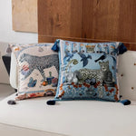 Decorative throw pillows featuring twin leopard designs with colorful tassels, perfect for adding a touch of luxury to your home decor.