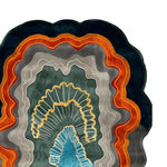 Vibrant and modern 'Layers of Time' hand-tufted area rug, showcasing an abstract design with bold colors and intricate patterns. Perfect as a contemporary rug for living rooms, this wool rug measures 8x10 and adds a striking visual element to any space.