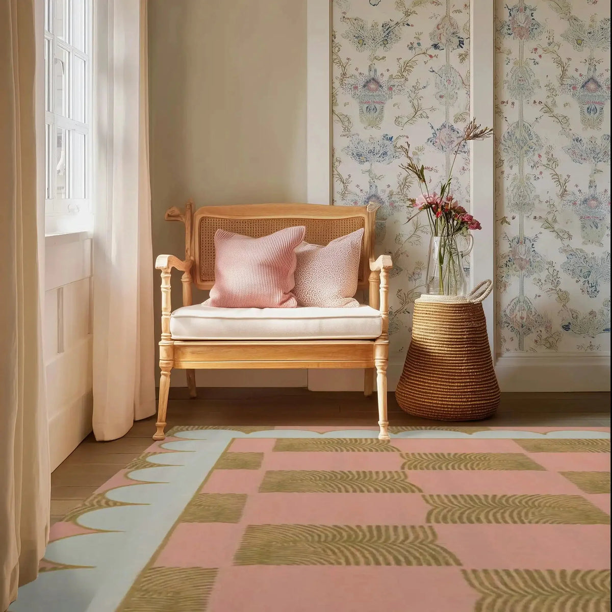 A beautifully styled living room featuring a Leaf Checker Scallop Pastel Hand Tufted Area Rug. This wool rug adds a boho charm with its pastel colors and unique pattern, perfect for both formal dining rooms and cozy living spaces. The soft textures complement the elegant wicker chair and floral wallpaper, creating a harmonious dining room setting.