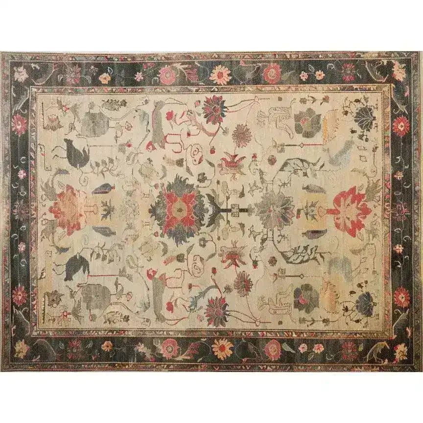 This vintage area rug, titled 'Legacy of Petals Hand Knotted Area Rug', features an intricate floral design reminiscent of Persian rugs. The rug showcases a harmonious blend of colors including red, beige, and blue, making it a perfect addition to living room decor.