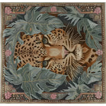 A stunning hand-knotted wool area rug featuring a detailed leopard design surrounded by lush green leaves. Perfect for adding a touch of nature and elegance to your bedroom or living room, this square area rug blends art with comfort, making it an ideal choice for rugs in both living room and bedroom settings.
