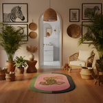 Living room with a leopard rug, plants, and wall art featuring animals.