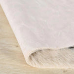 Close-up view of the Leopard Print Faux Cowhide Skin Rug, highlighting the soft texture and detailed design, perfect for large living room rugs or living room rugs 8x10.