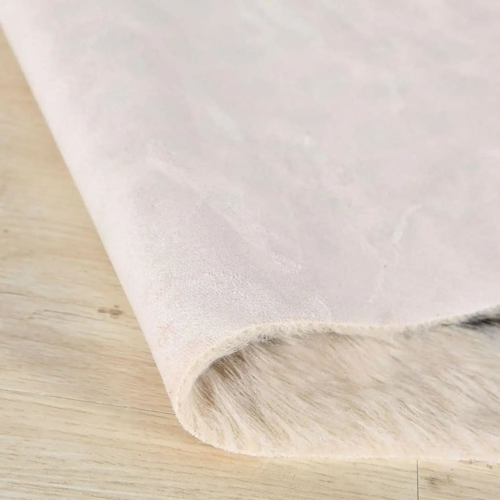 Close-up view of the Leopard Print Faux Cowhide Skin Rug, highlighting the soft texture and detailed design, perfect for large living room rugs or living room rugs 8x10.