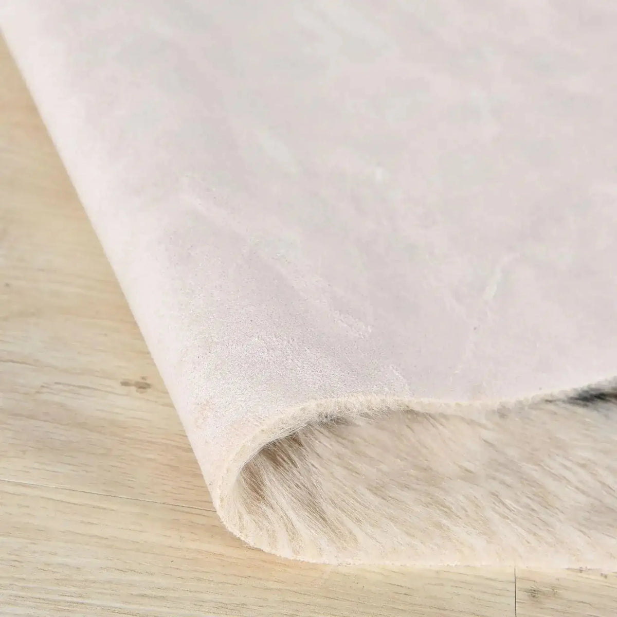 Close-up view of the Leopard Print Faux Cowhide Skin Rug, highlighting the soft texture and detailed design, perfect for large living room rugs or living room rugs 8x10.