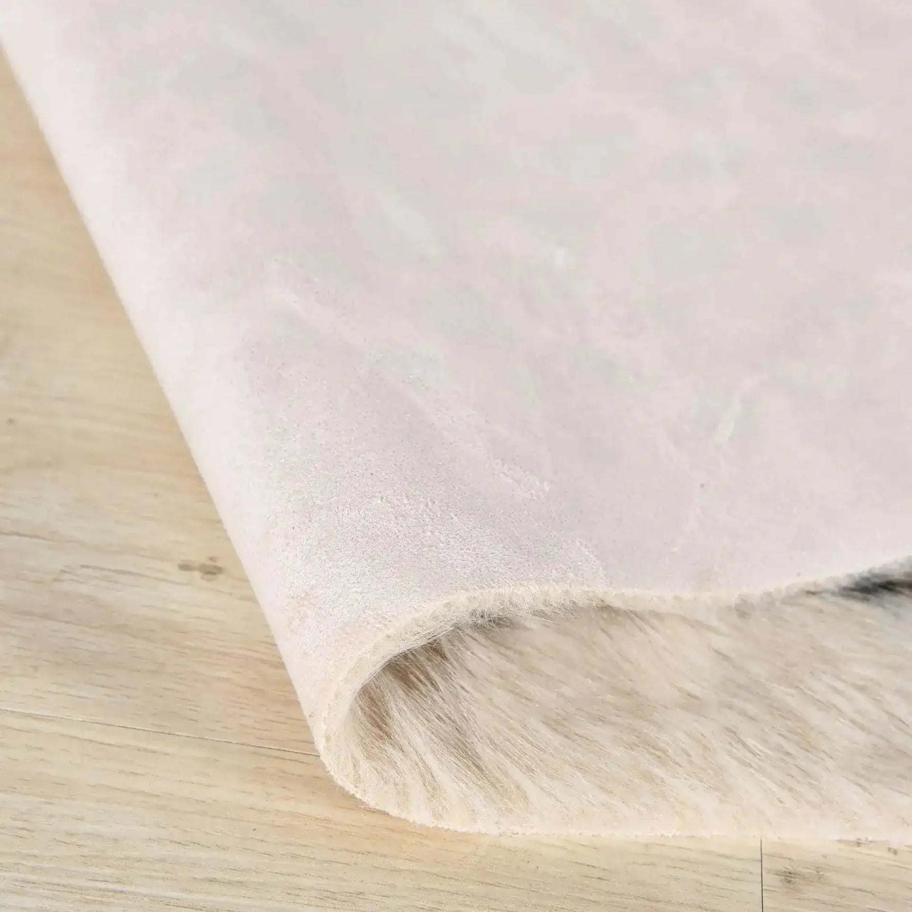 Close-up view of the Leopard Print Faux Cowhide Skin Rug, highlighting the soft texture and detailed design, perfect for large living room rugs or living room rugs 8x10.