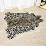 Stylish area rug featuring a leopard print faux cowhide design, perfect for enhancing large living spaces. This 8x10 rug adds a touch of wild elegance to your living room decor.
