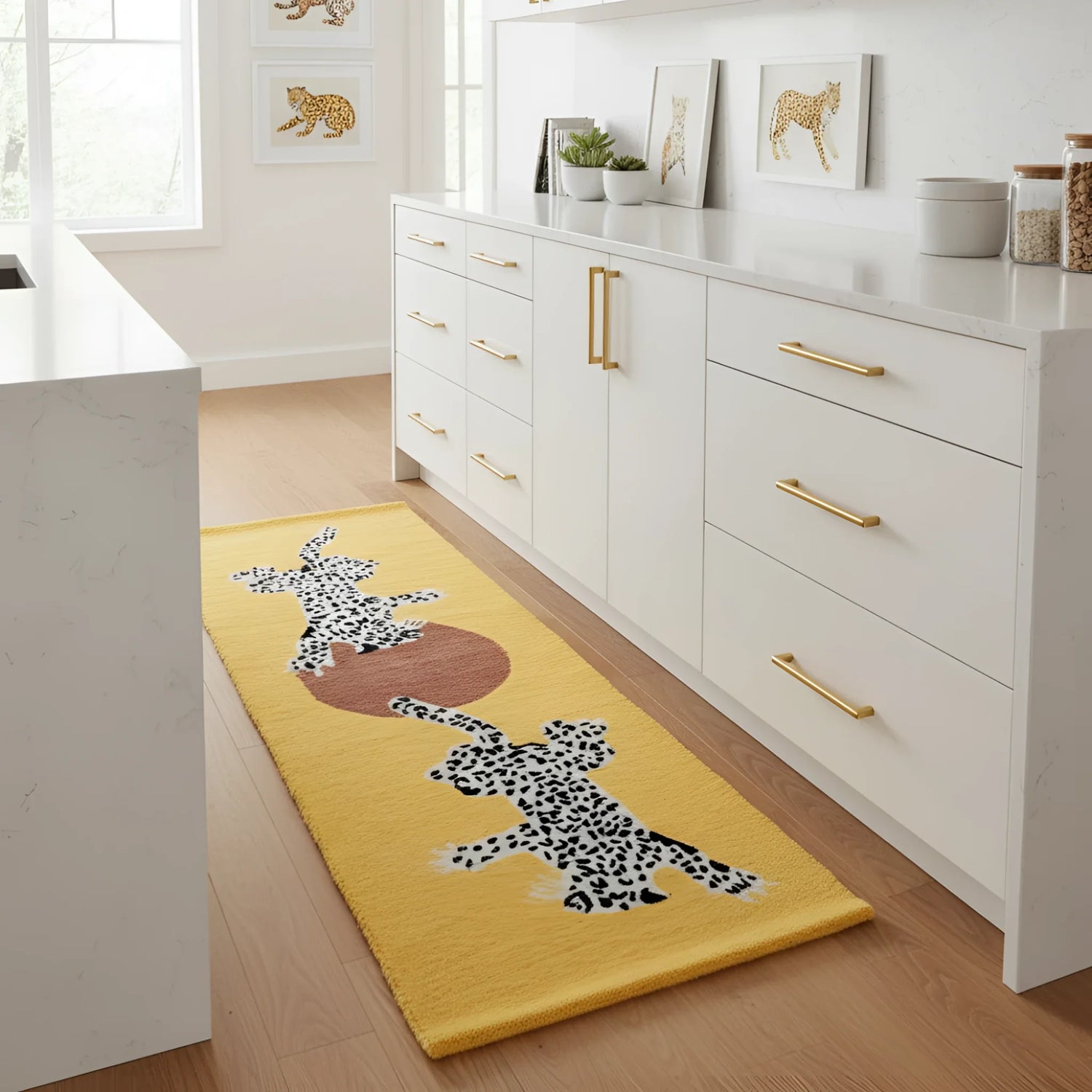 Yellow rug with animal design on a wooden floor in a kitchen.