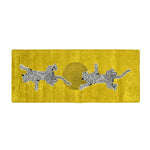 Vibrant hand tufted wool rug featuring playful leopards against a warm yellow background, perfect for adding a touch of wild elegance to your living room or as a stylish hallway runner rug.