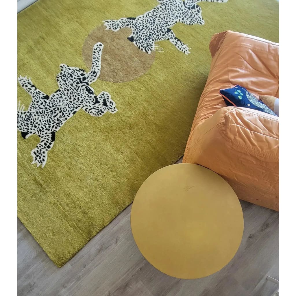 Top view of a unique wool area rug featuring playful leopards on a vibrant green background, perfect for adding a touch of the wild to your living room, hallway, or kitchen. This hand tufted wool rug runner is ideal for those seeking stylish kitchen rugs, a hallway runner rug, or large area rugs for the living room.