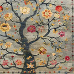 A beautifully detailed area rug featuring an intricate floral design with vibrant blossoms on twisting branches, perfect for adding a touch of elegance to any living room. This vintage-inspired piece captures the classic charm of Persian rugs, making it an ideal choice for those seeking stylish rugs for living room spaces.