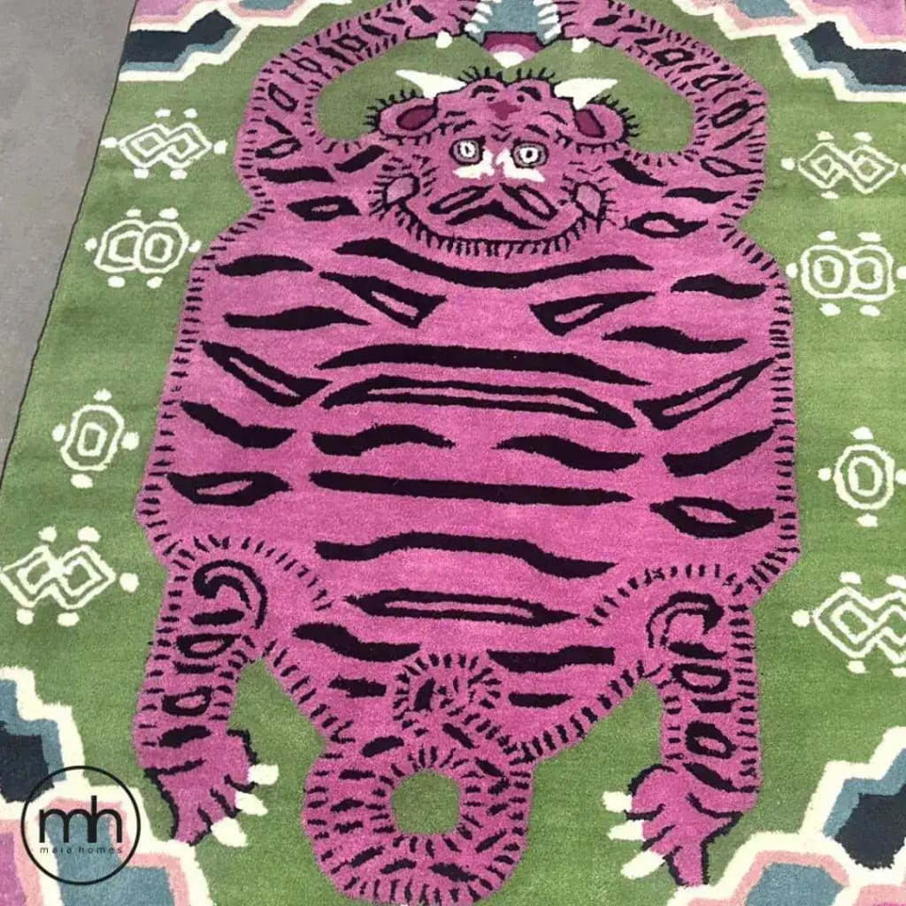 Top view of a light green oriental tiger hand-tufted wool rug, featuring a bold abstract tiger design in purple and black. This vintage rug adds a unique touch to any bedroom or office, offering a stylish and durable area rug option.