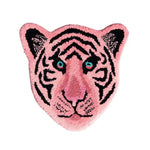 Light Pink Tiger Face Hand-Tufted Wool Accent Rug, perfect for adding a unique touch to your living room or dining room. This area rug features a striking tiger face design in shades of pink and black, making it a standout piece for formal dining room decor and living room aesthetics.